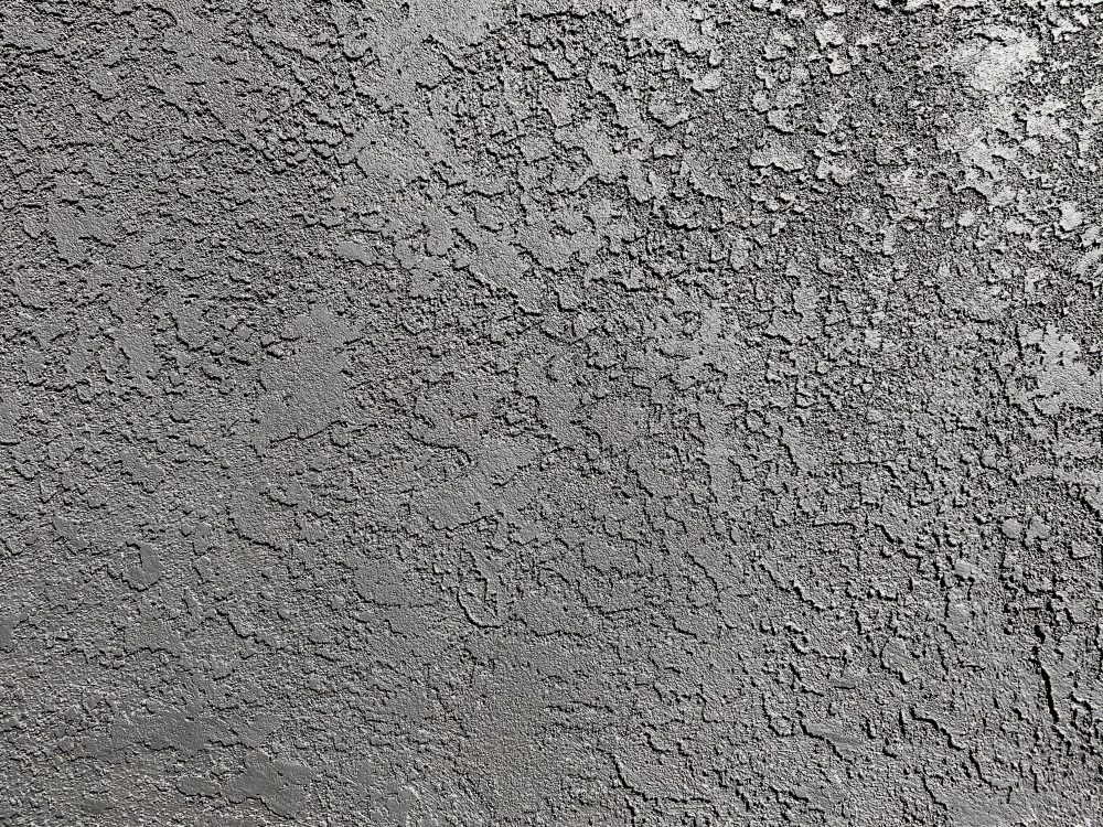 Textured slate gray stucco background